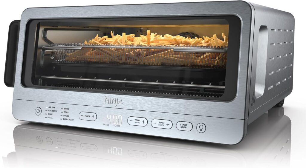 “Ninja Flip Toaster Oven air frying crispy chicken wings on a wire rack.” “Family enjoying a 13-inch pizza baked in the Ninja SP151.” “Compact Ninja Flip oven stored vertically beside a coffee maker.” Hashtags: #KitchenHacks #AirFryerMagic #SmallSpaceLiving